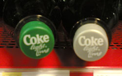 Två olika korkar från Coca-cola light lime